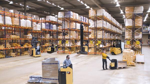 Cat lift trucks group photo in warehouse